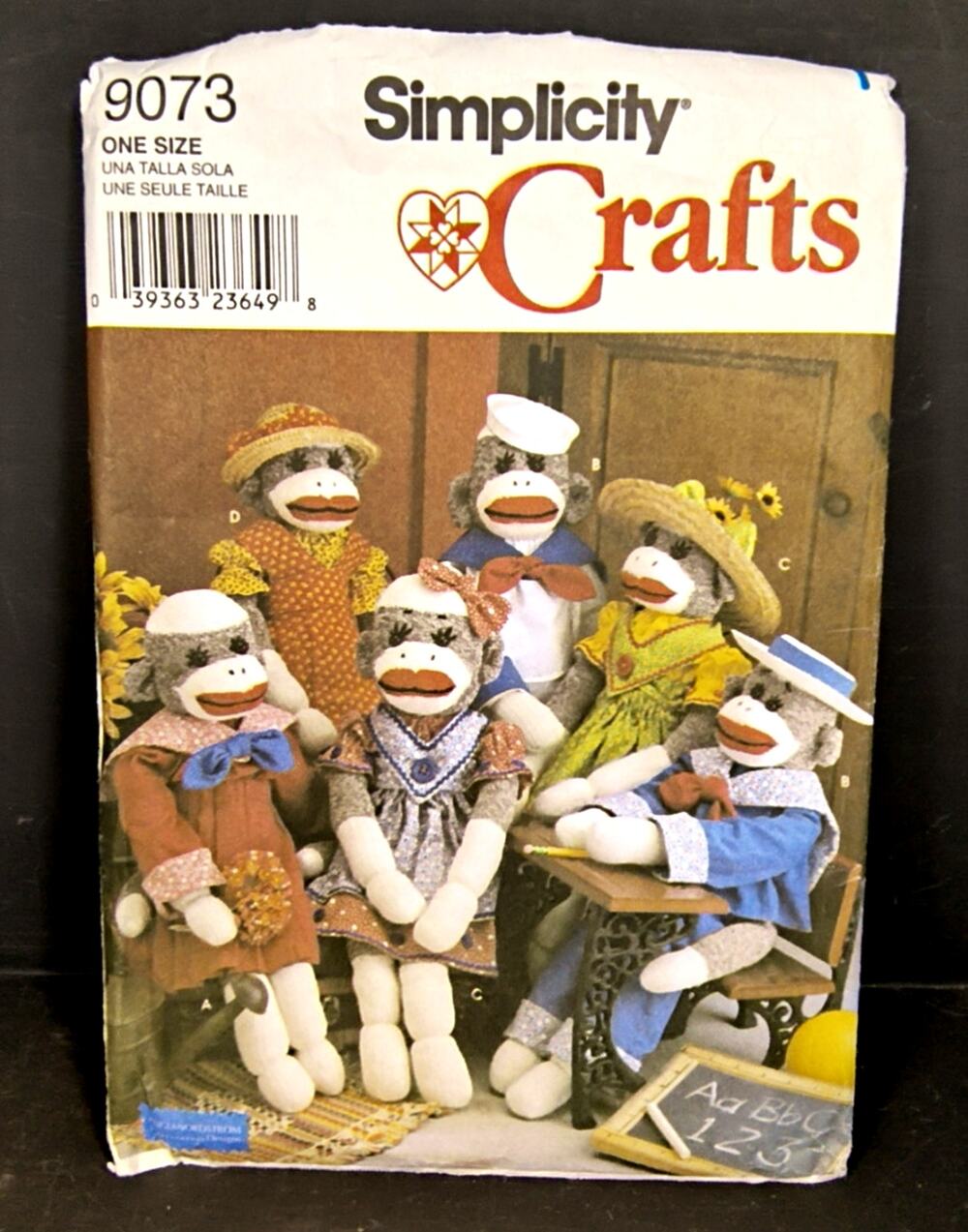 2232.  Simplicity Crafts Sock Monkey and Wardrobe Pattern No. 9073 Partially Cut